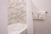 Thumbnail 26 of 56 - Bathroom with quartz tile in Luxury 2 Bedroom Apartments Leawood, KS