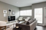 Thumbnail 21 of 36 - Luxury Apartments Des Moines model living room with modern furniture and decor