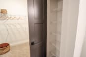 Thumbnail 8 of 41 - The Wren 1 bedroom model apartment home linen closet located in Lawrenceville,GA