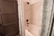 Thumbnail 7 of 41 - The Wren 1 bedroom model apartment home bathroom with soaking tub located in Lawrenceville,GA