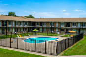 Thumbnail 7 of 17 - Swimming pool at Huntington Club Apartments in Warren, Michigan
