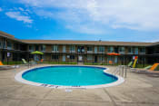 Thumbnail 8 of 17 - Swimming pool at Huntington Club Apartments in Warren, Michigan