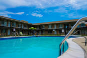 Thumbnail 9 of 17 - Swimming pool at Huntington Club Apartments in Warren, Michigan