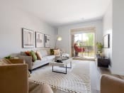 Thumbnail 1 of 23 - a living room with grey walls and a white rug