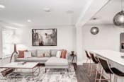 Thumbnail 3 of 29 - a living room with white walls and hardwood floors at Hamilton at Kings Place, Columbia, MD 21046