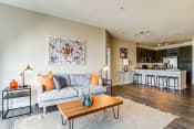 Thumbnail 6 of 40 - Living Room With Kitchen at Aspire Apollo, Camp Springs, MD