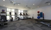 Thumbnail 27 of 33 - Fitness Center cardio area at The Gallery Midtown Apartments in Richmond, VA