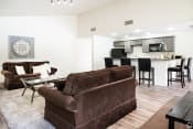 Thumbnail 3 of 22 - Living Room With Kitchen View at Summit Ridge Apartments, Temple, TX