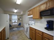 Thumbnail 2 of 22 - Refrigerator and Kitchen Appliances at Woodridge Apartments, Randallstown, 21133