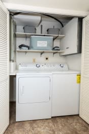 Thumbnail 16 of 22 - a washer and dryer are located in the laundry room at Chapel Valley Townhomes, Baltimore, MD 21236