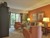 Thumbnail 13 of 24 - Large living room with private balcony at Liberty Gardens Apartments, Maryland, 21244