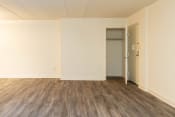 Thumbnail 9 of 66 - Empty room with white walls and wood floors at Ivy Hall Apartments*, Towson, MD 21204