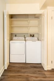 Thumbnail 5 of 66 - Small laundry room with a washer and dryer at Ivy Hall Apartments*, Towson