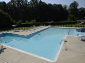 Thumbnail 18 of 22 - Poolside Entertainment Area at Woodridge Apartments, 3901 Noyes Circle, Randallstown, MD 21133