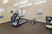 Thumbnail 5 of 8 - Fitness center at Cypress View Villas Apartments in Weatherford, TX