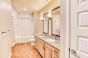 Thumbnail 11 of 31 - Bathroom with Designer Granite Countertops at The Parker at Maitland Station in Maitland, FL