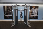 Thumbnail 13 of 22 - a pair of exercise machines in a gym