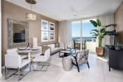 Thumbnail 10 of 14 - a living room with a large window and a view of the ocean at Regatta at New River, Florida