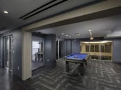 Thumbnail 8 of 12 - a spacious game room with a pool table and a bar at Saba Pompano Beach, Florida