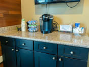 Thumbnail 25 of 27 - coffee station in leasing office