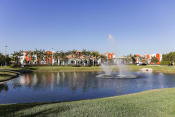 Thumbnail 4 of 30 - East Village Apartments' lake with fountain