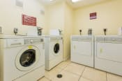 Thumbnail 18 of 24 - on-site laundry facility with washers & dryers