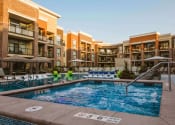 Thumbnail 1 of 75 - An outdoor pool at an apartment home complex at The Apex at CityPlace, Overland Park, KS