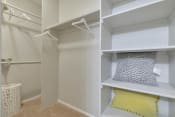 Thumbnail 22 of 48 - Closet with shelves and hanging space at Monterra Ridge Apartments, Canyon Country, California