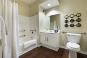 Thumbnail 12 of 33 - Bathroom with sink and bath at Wilshire Vermont, 90010
