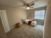 Thumbnail 17 of 18 - Bedroom With Ceiling Fan at Auburn Glen Apartments, Jacksonville, Florida