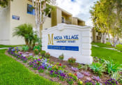 Thumbnail 11 of 11 - Mesa Village Apartments Exterior Front Sign
