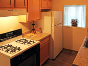 Thumbnail 4 of 22 - Electric Range In Kitchen at Willoughby Hills Towers, Ohio, 44092