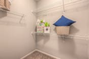 Thumbnail 76 of 78 - this is a photo of the closet with white racks  at EdgeWater at City Center, Lenexa, KS, 66219