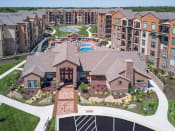 Thumbnail 24 of 78 - an aerial view of a large complex with a pool and landscaping  at EdgeWater at City Center, Lenexa, KS, 66219
