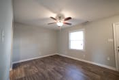 Thumbnail 5 of 28 - Unfurnished apartment with ceiling fan and light at Barrington Estates Apartments, Indianapolis, IN