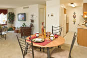 Thumbnail 7 of 17 - Fitted Kitchen With Island Dining at Dannybrook Apartments, Williamsville, NY, 14221
