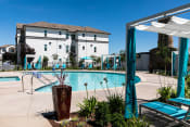 Thumbnail 11 of 48 - Pool with Lounge Chairs l The James Apartments in Rocklin CA 