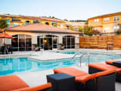 Thumbnail 12 of 26 - Apartments in El Dorado Hills, CA l Lesarra Apartments l Pool and lounge chairs 