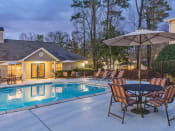Thumbnail 26 of 38 - Enjoy Our Pool Deck with Patio and Chairs at Addison on Cobblestone, Fayetteville, 30215