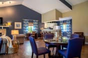 Thumbnail 10 of 35 - Clubhouse amenity with blue chairs 