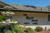 Thumbnail 2 of 16 - Property Signage at Reef Apartments, Fresno, 93704