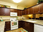 Thumbnail 4 of 7 - Fully Furnished Kitchen With Stainless Steel Appliances at Villa Faria Apartments, Fresno, CA, 93720