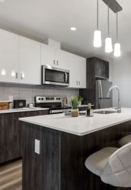 a kitchen with a sink and a counter top