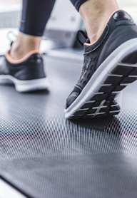 A person is running on a treadmill.