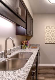 the avenues salt lake custom homes interior kitchen with granite countertops and stainless steel appliances