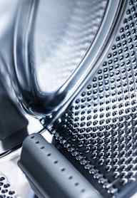 A close up of a washing machine drum.