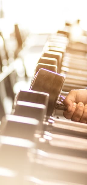 Person lifting weights at The Morgan, Lafayette, CA, 94549