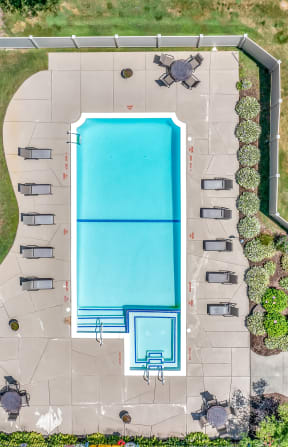 arial view of a swimming pool and patio with umbrellas at Edge At Farmington Hills - Farmington Hills, MI, Michigan, 48334