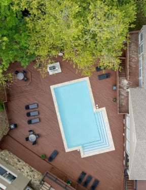 arial view of a house with a swimming pool at Creekview Apartment Homes, Texas