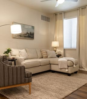 Light and Bright Living Area at Four Seasons Apartments and Townhomes